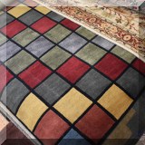 R71. Contemporary colorful checkerboard rug.